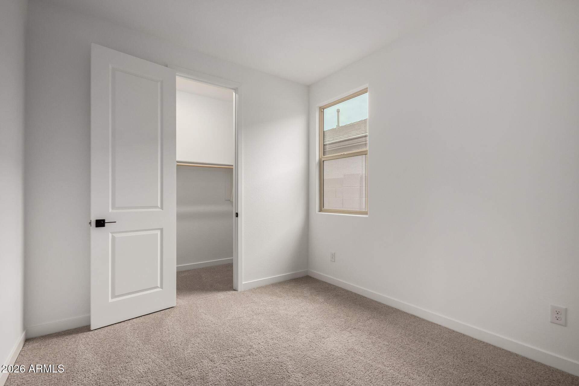 8026 West Granada Road Phoenix, AZ 85035 - Photo 15 of 31 a view of an empty room with a window