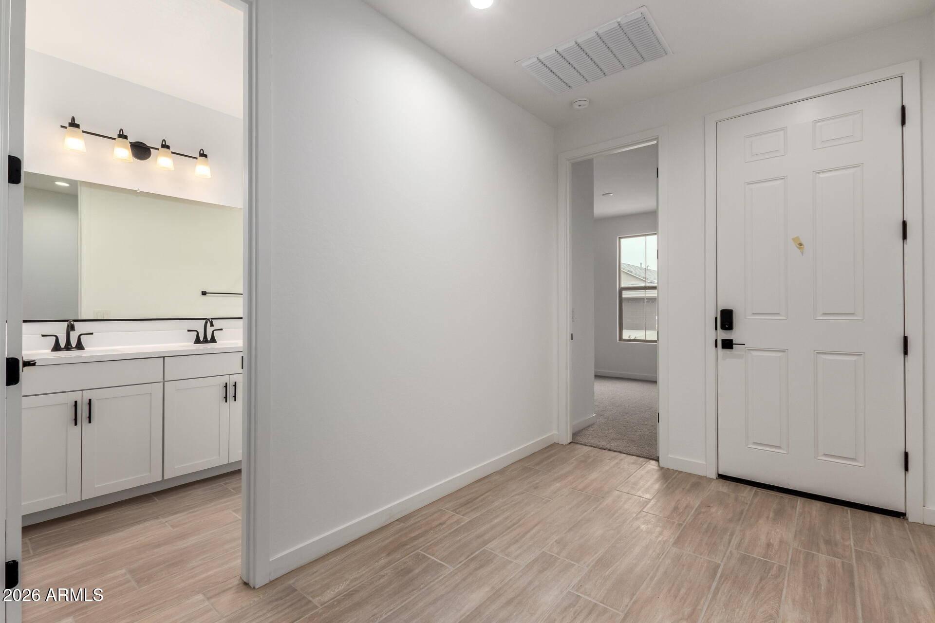 8026 West Granada Road Phoenix, AZ 85035 - Photo 7 of 31 a bathroom with a sink and a mirror