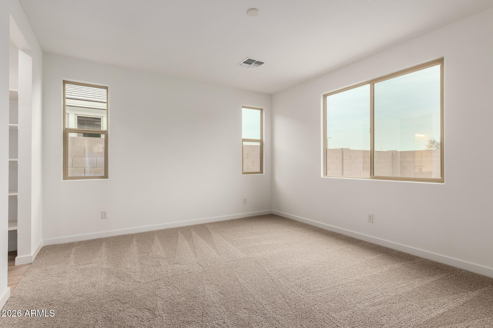 8026 West Granada Road Phoenix, AZ 85035 - Photo 8 of 31 an empty room with a window