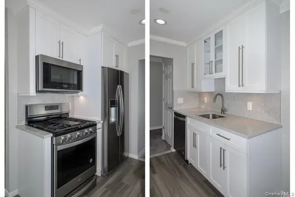 a kitchen with stainless steel appliances a stove a sink and a refrigerator