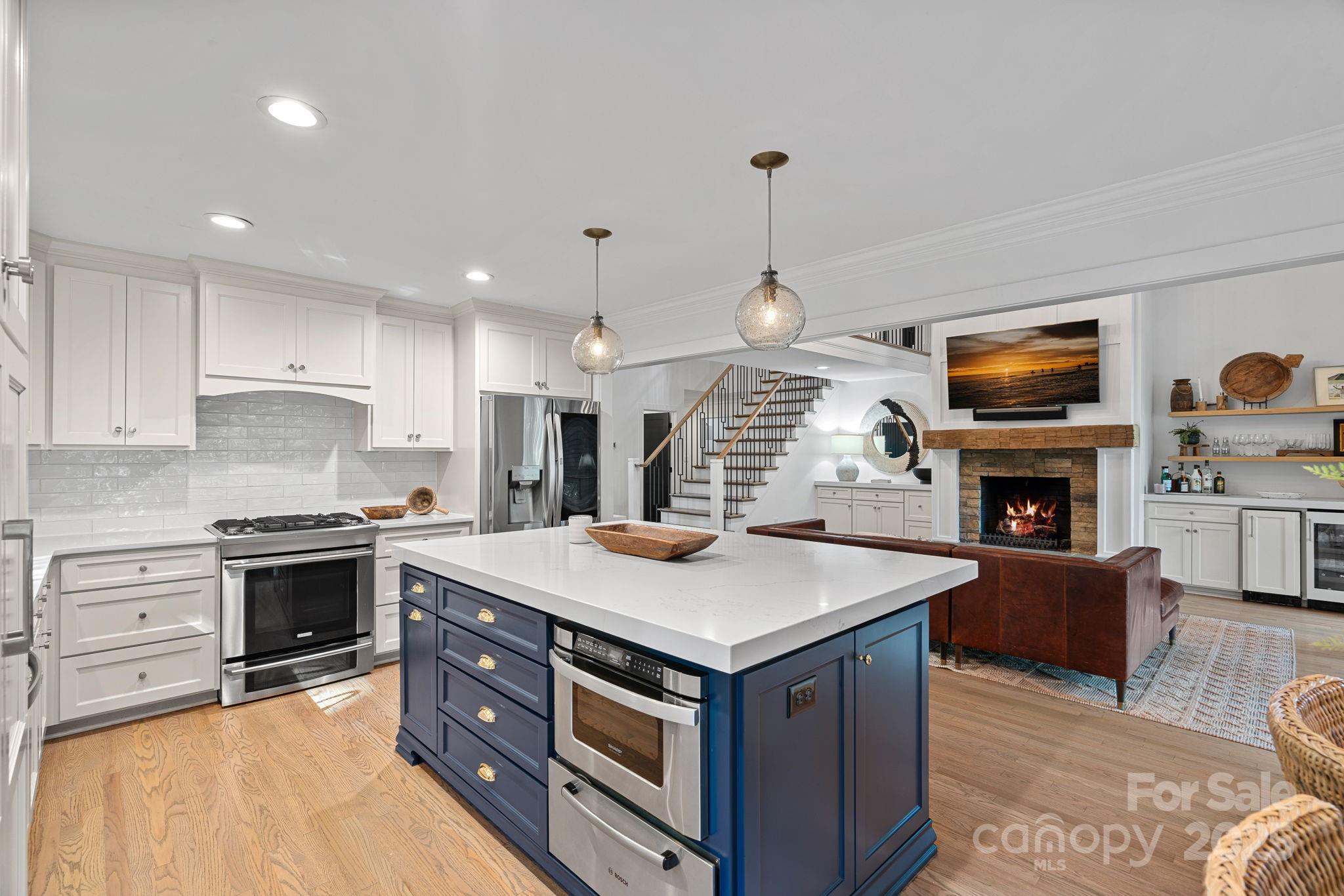19624 Meta Road Cornelius, NC 28031 - Photo 13 of 44 a kitchen with sink stove and cabinets