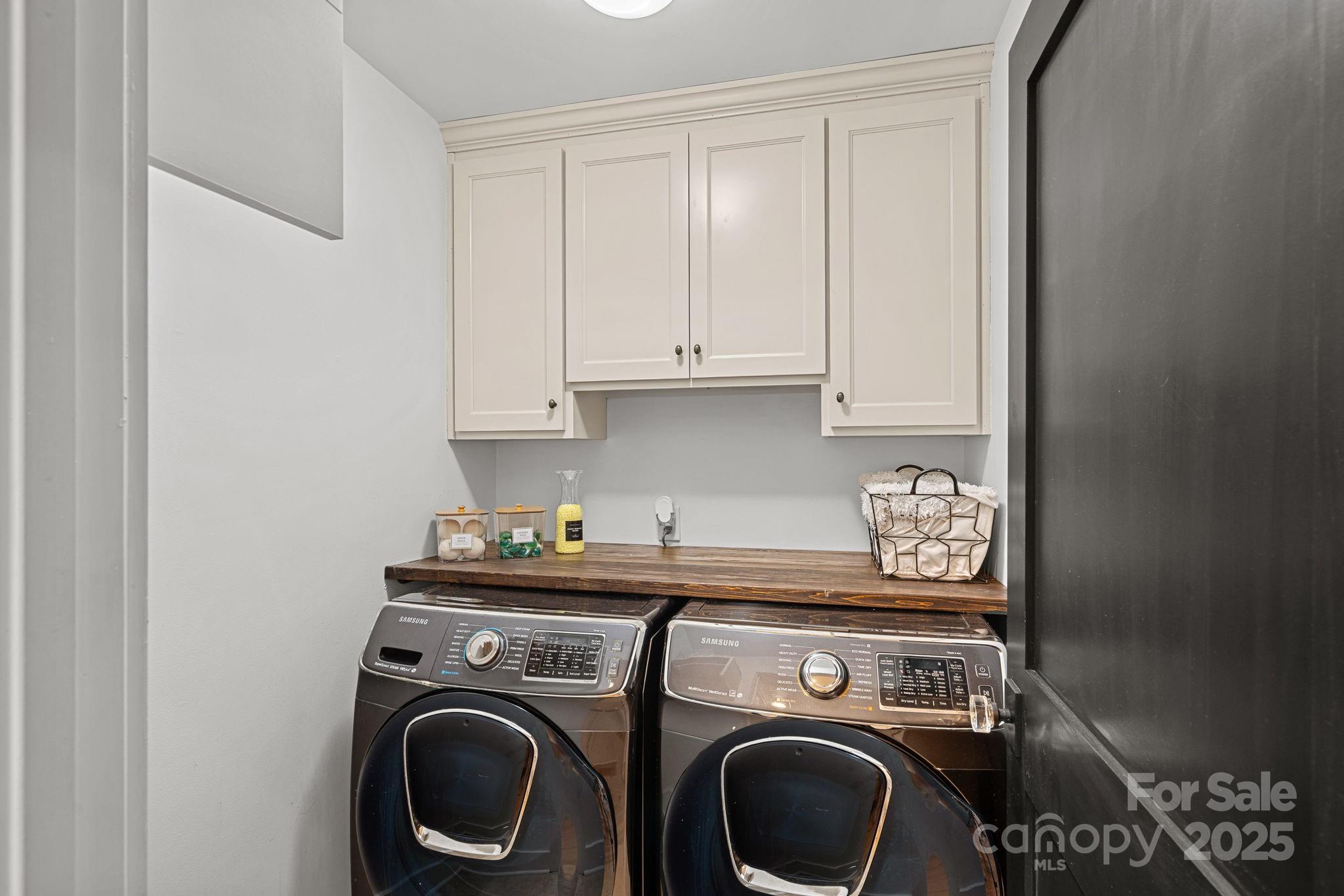 19624 Meta Road Cornelius, NC 28031 - Photo 18 of 44 a utility room with dryer and washer