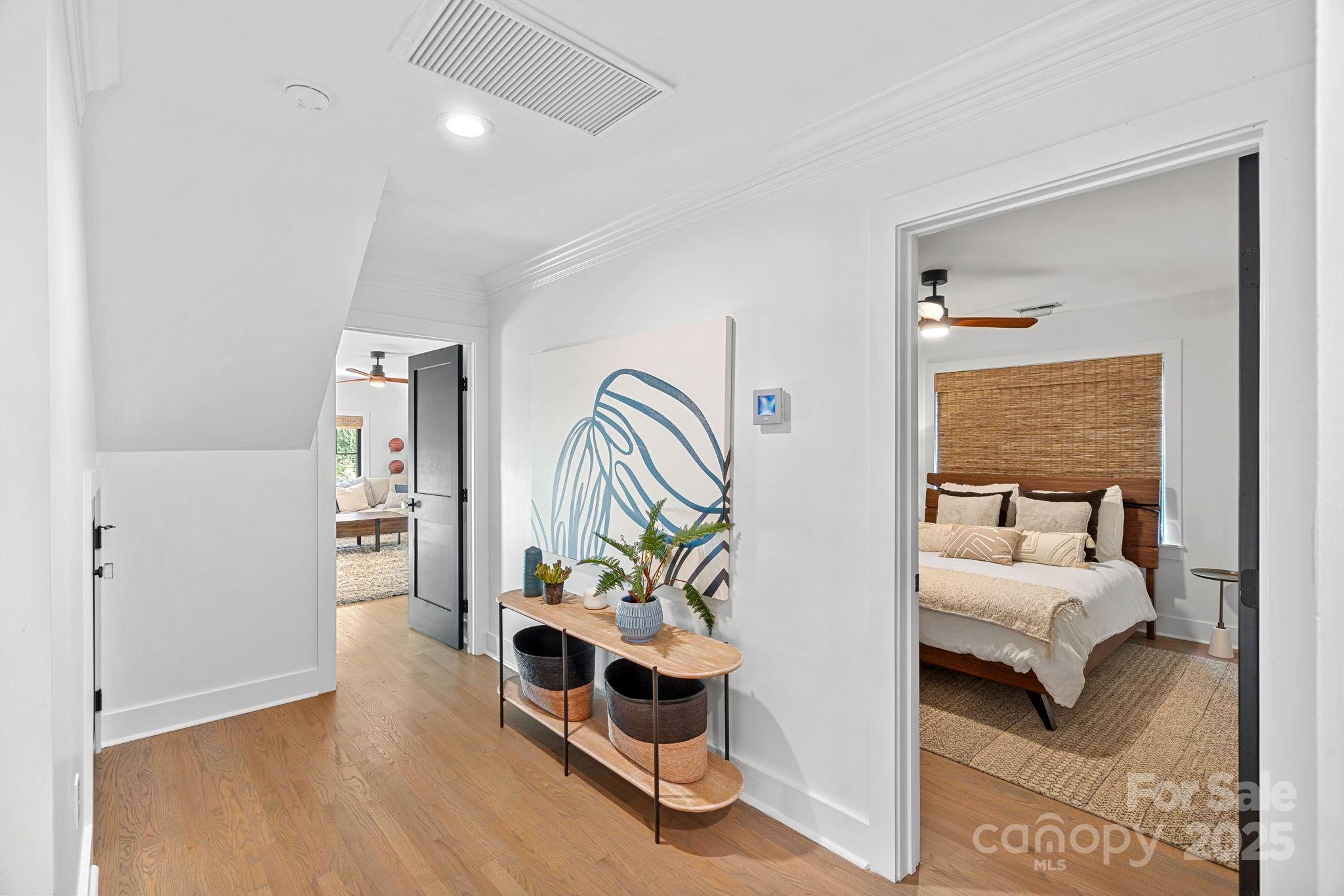 19624 Meta Road Cornelius, NC 28031 - Photo 24 of 44 a bedroom with furniture and a window