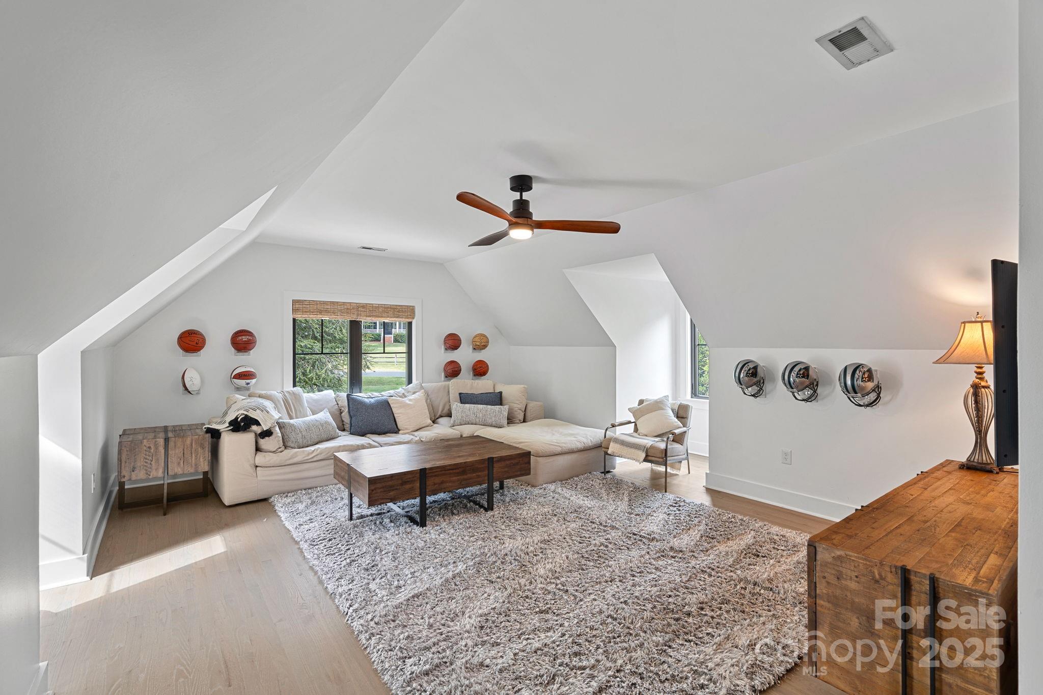 19624 Meta Road Cornelius, NC 28031 - Photo 26 of 44 a living room with furniture and a window