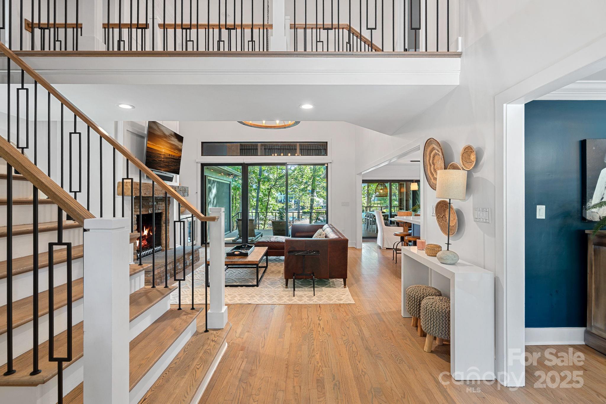 19624 Meta Road Cornelius, NC 28031 - Photo 3 of 44 a living room with furniture and a wooden floor