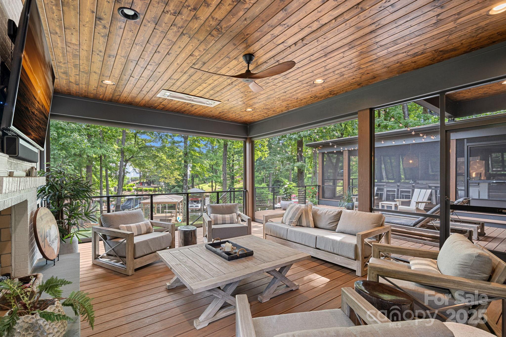 19624 Meta Road Cornelius, NC 28031 - Photo 40 of 44 a living room with furniture and a large window