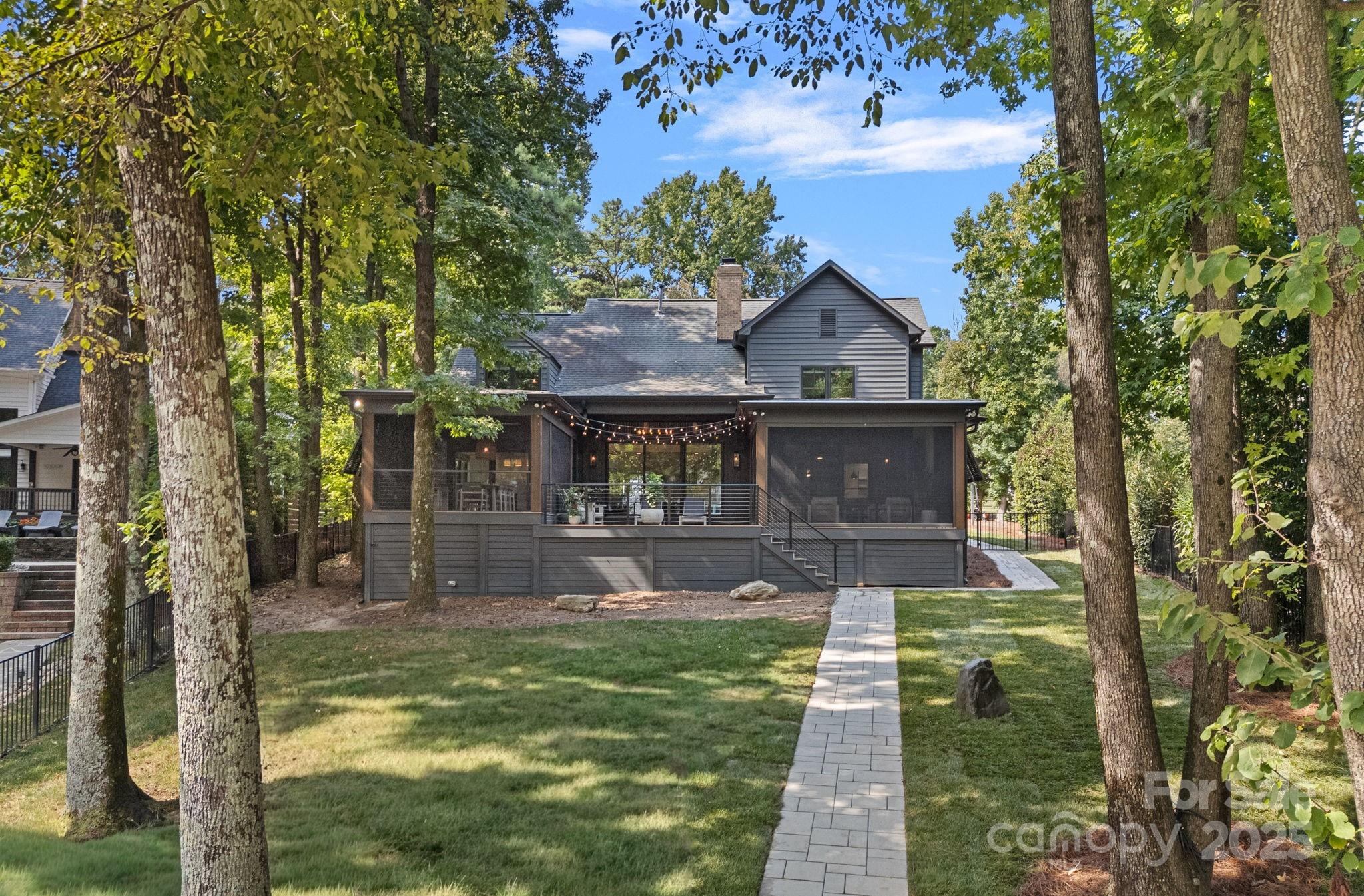 19624 Meta Road Cornelius, NC 28031 - Photo 41 of 44 a front view of a house with garden