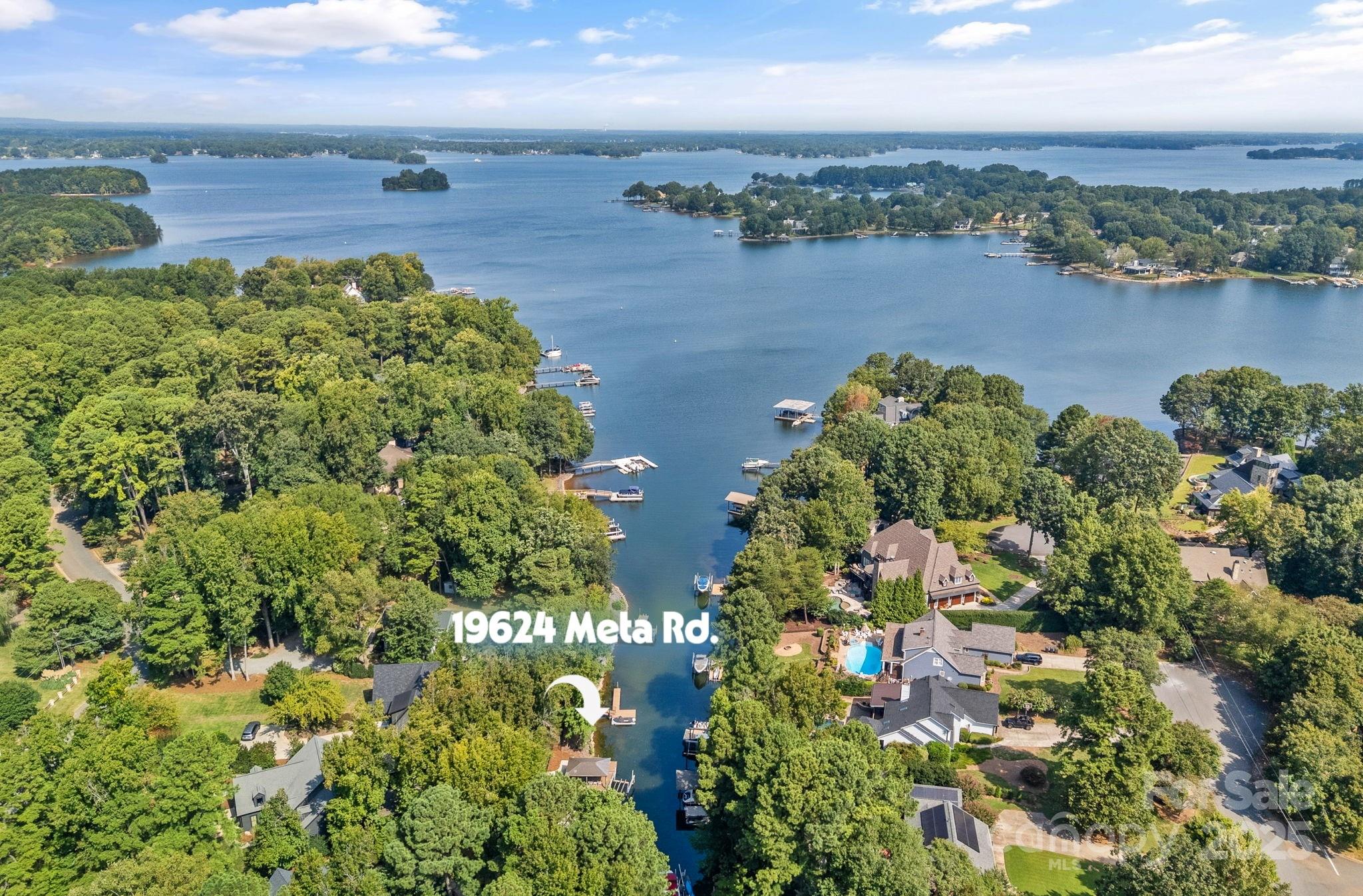 19624 Meta Road Cornelius, NC 28031 - Photo 44 of 44 an aerial view of a houses with a lake view