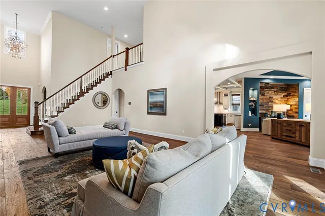 a view of an entryway with wooden floor