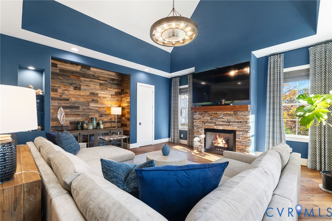 16118 Old Castle Road Midlothian, VA 23112 - Photo 15 of 50 a living room with furniture a fireplace and a flat screen tv
