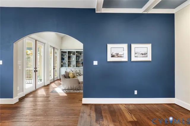 a kitchen with stainless steel appliances cabinets and window