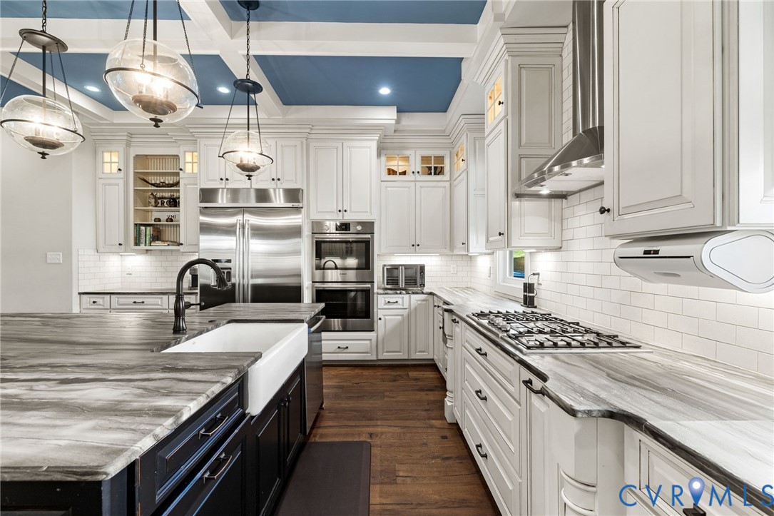 16118 Old Castle Road Midlothian, VA 23112 - Photo 22 of 50 a kitchen with stainless steel appliances granite countertop a stove and a sink