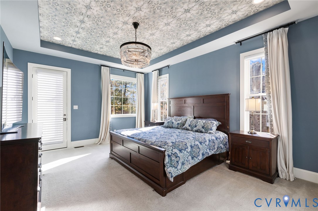 16118 Old Castle Road Midlothian, VA 23112 - Photo 25 of 50 a bedroom with a large bed and a large window