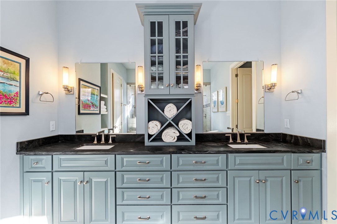 16118 Old Castle Road Midlothian, VA 23112 - Photo 28 of 50 a bathroom with a granite countertop sink and a mirror