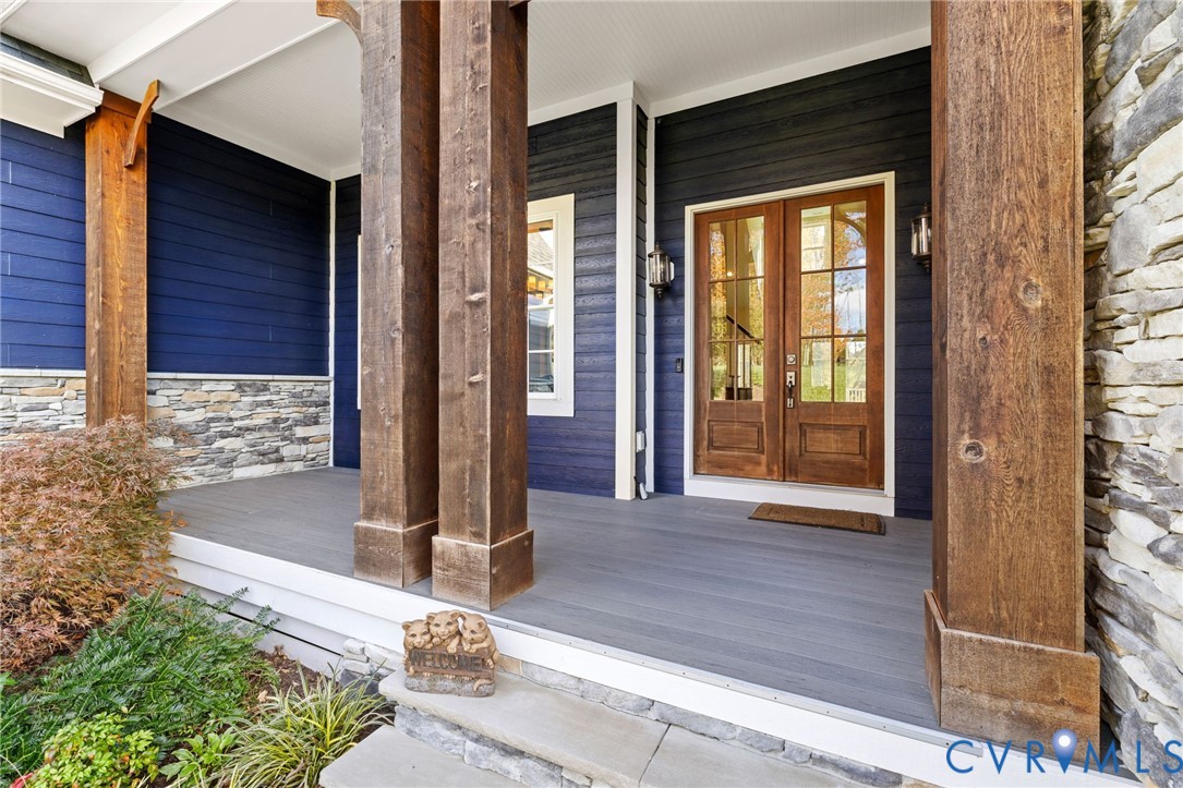 16118 Old Castle Road Midlothian, VA 23112 - Photo 3 of 50 a front view of a house with a porch