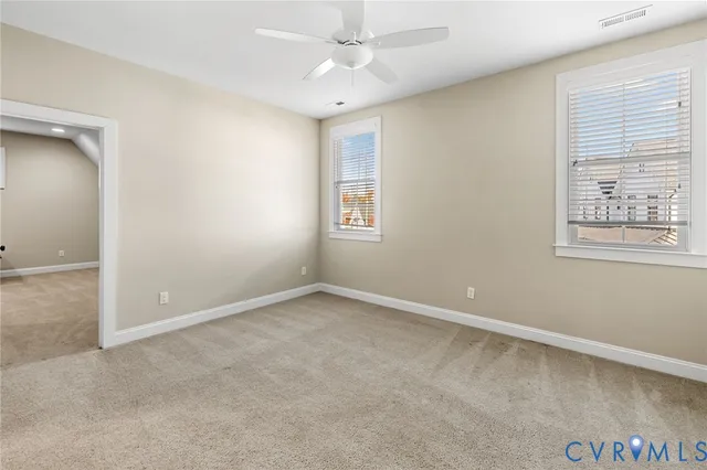 an aerial view of houses with yard