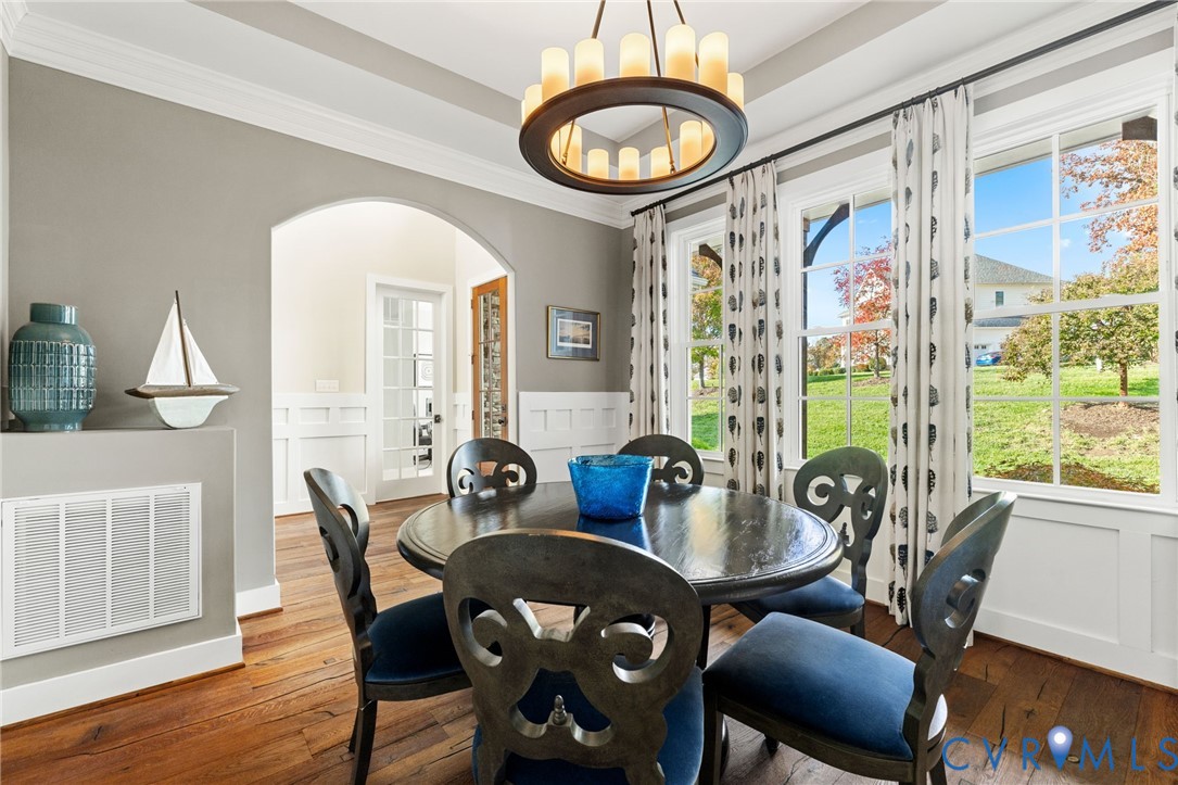 16118 Old Castle Road Midlothian, VA 23112 - Photo 7 of 50 a view of a dining room with furniture window and wooden floor