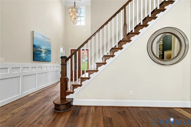 a living room with furniture fireplace and window