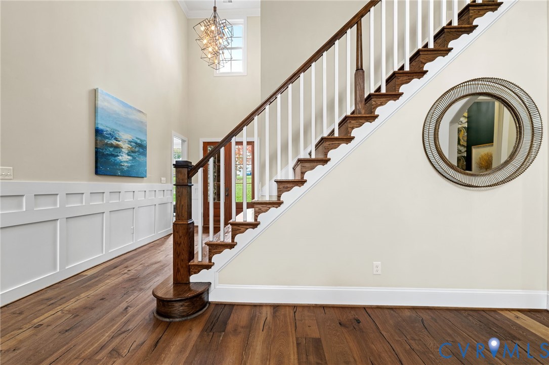 16118 Old Castle Road Midlothian, VA 23112 - Photo 9 of 50 a view of front door with wooden floor and stairs