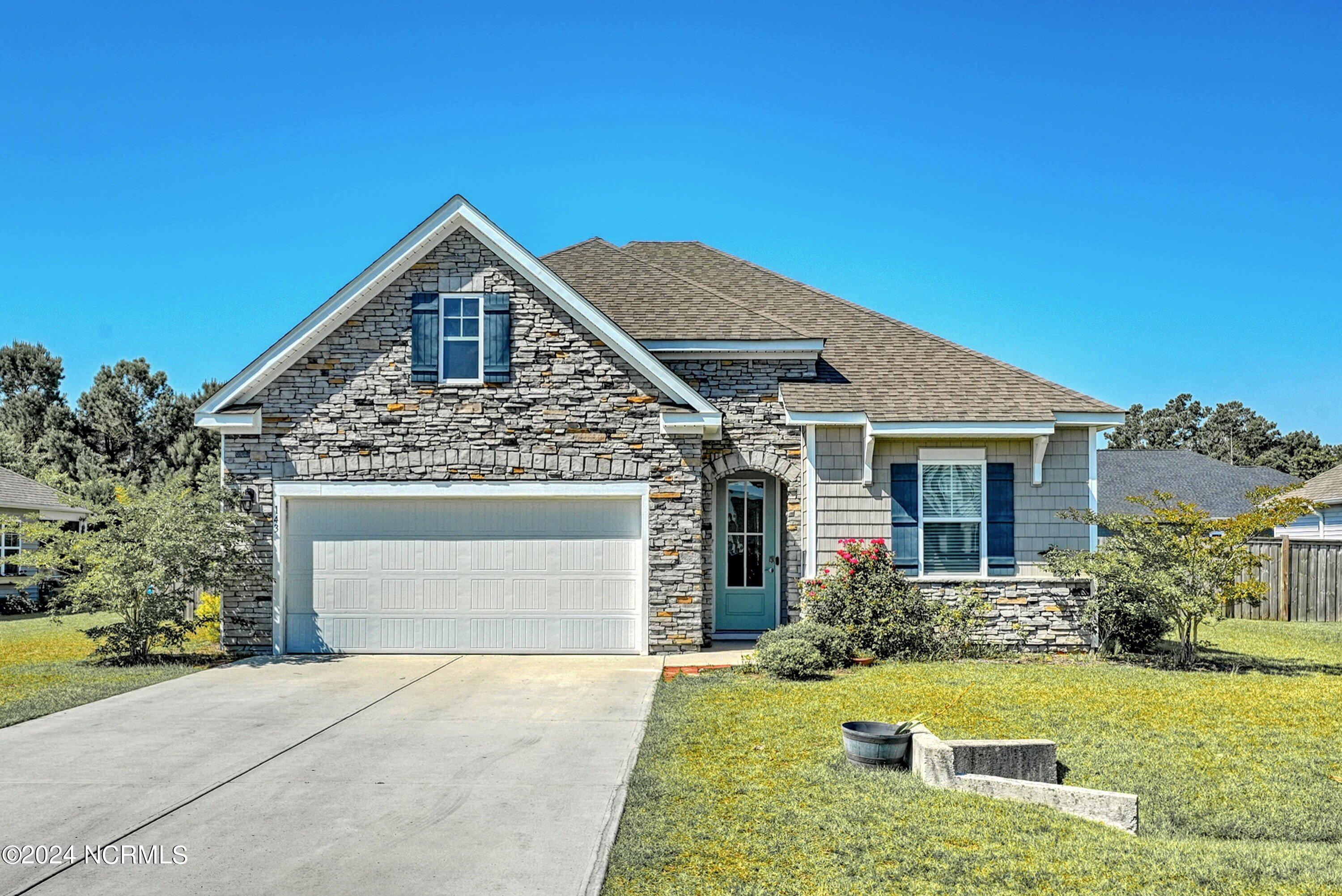 143 Seneca Reef Drive Hampstead, NC 28443 - Photo 2 of 38 02-4_A7406255_1