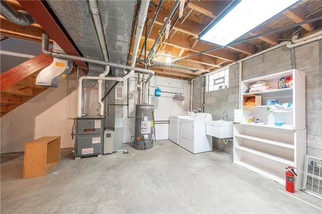 a view of a patio with dining table and chairs with wooden floor and fence