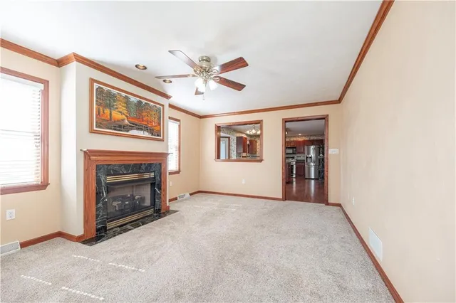 a kitchen with stainless steel appliances kitchen island granite countertop wooden floors and stainless steel appliances
