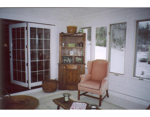 94 Kettle Hole Road Bolton, MA 01740 - Photo 3 of 5 a living room with furniture and a window