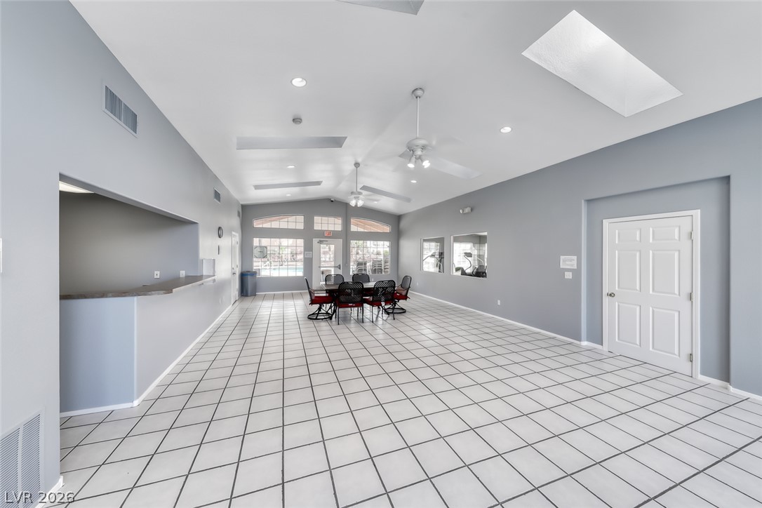 205 Genesee Point Street Henderson, NV 89074 - Photo 26 of 30 Tiled floors and overhead skylights anchor this versatile community room.
