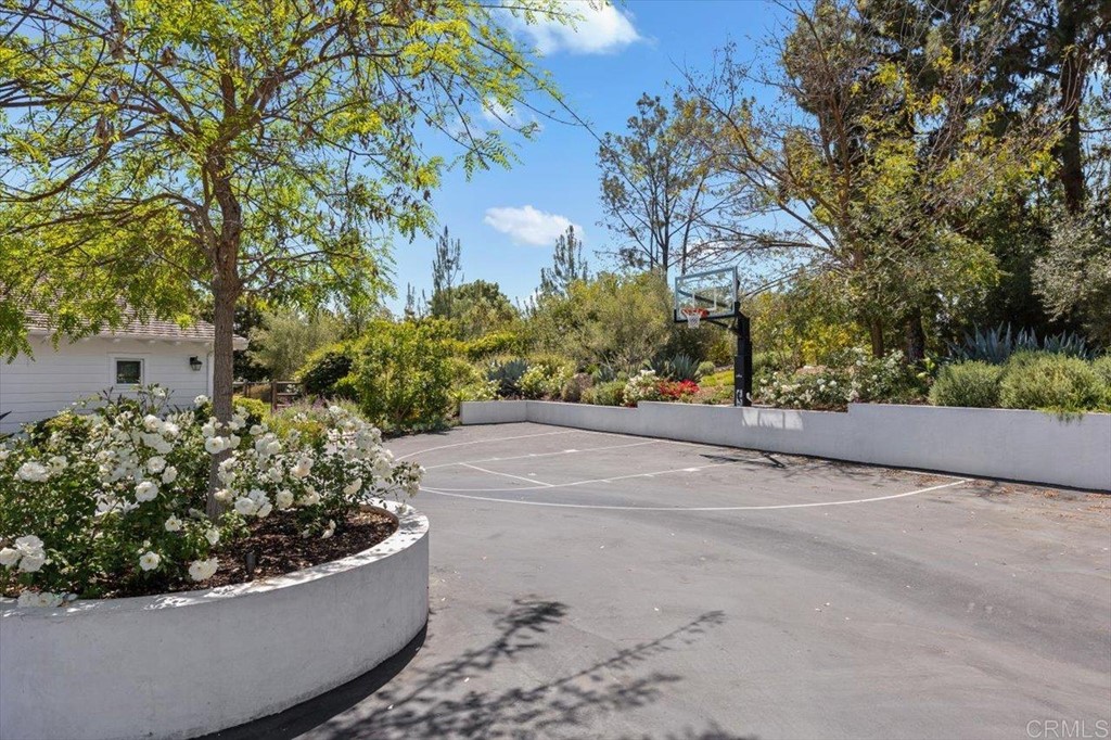 6531 Mimulus Rancho Santa Fe, CA 92067 - Photo 2 of 15 a view of a flower garden in a backyard