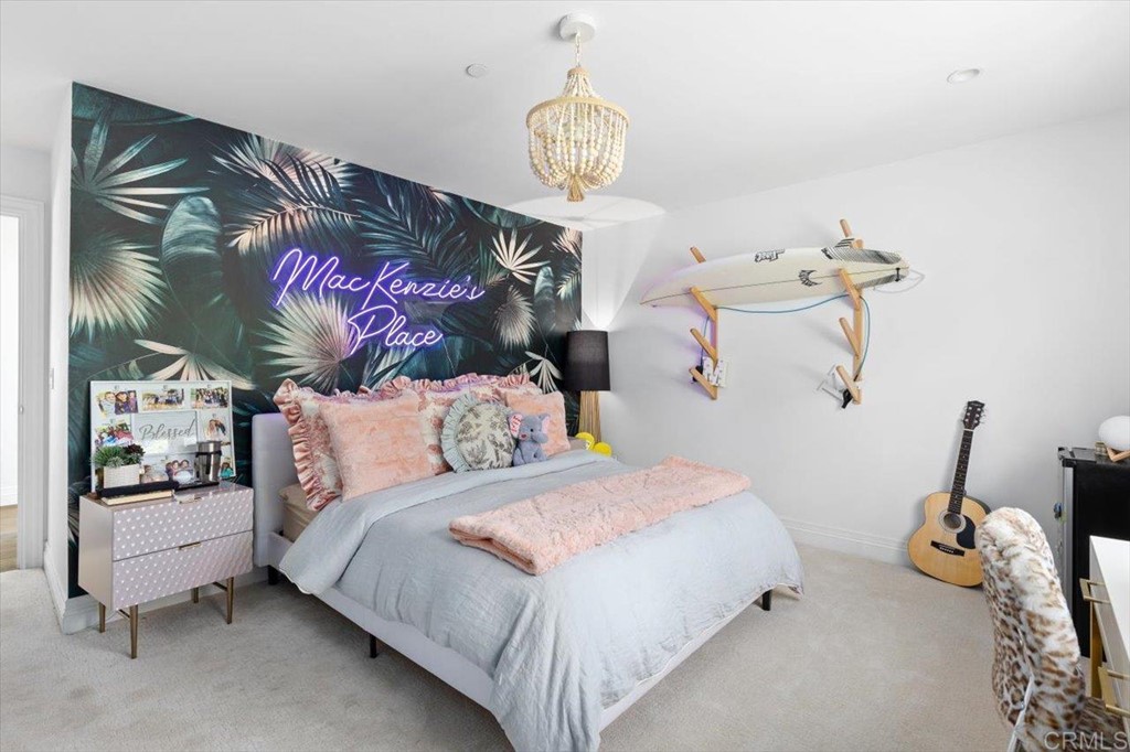6531 Mimulus Rancho Santa Fe, CA 92067 - Photo 3 of 15 a bedroom with a bed and a chandelier