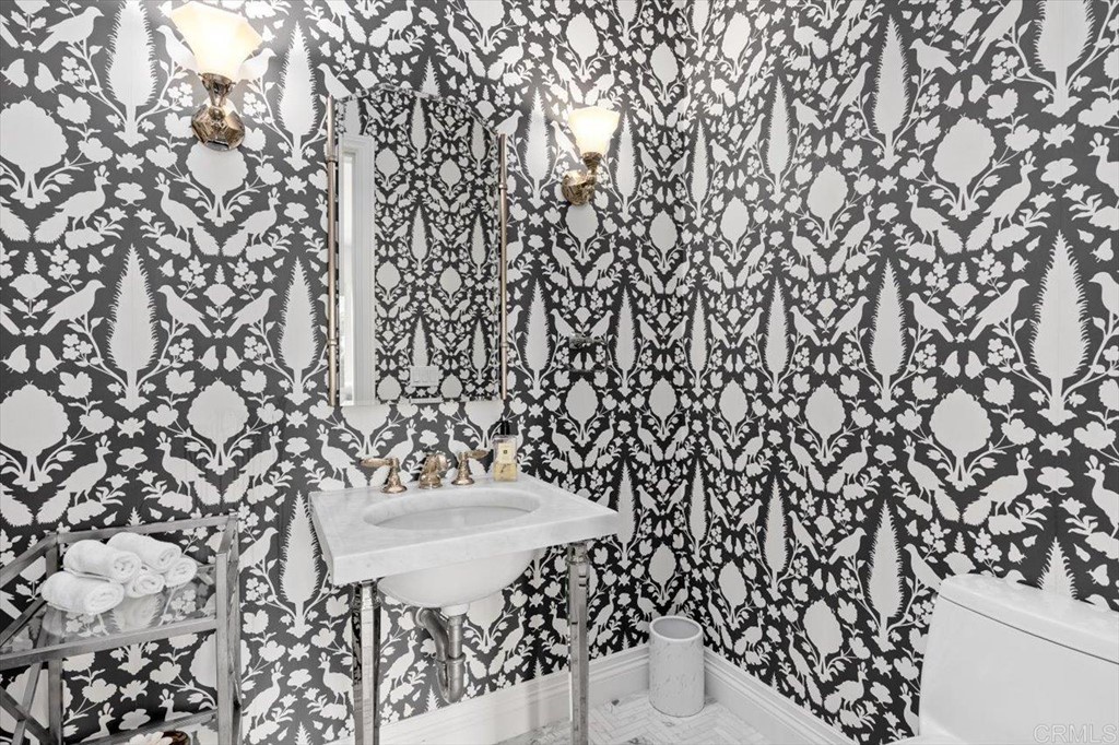 6531 Mimulus Rancho Santa Fe, CA 92067 - Photo 4 of 15 a bathroom with a sink and a mirror