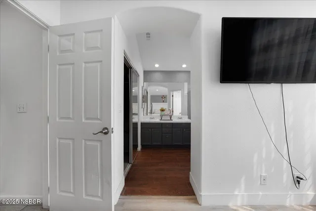 a bathroom with a sink and mirror