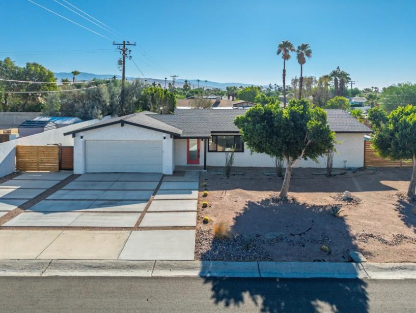 a house view with a outdoor space