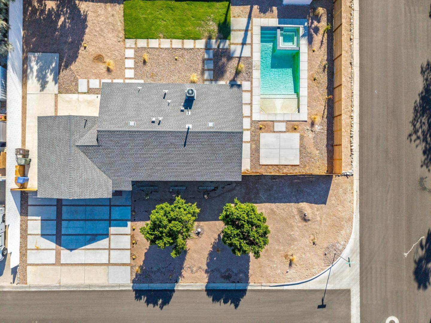 2600 North Chuperosa Road Palm Springs, CA 92262 - Photo 13 of 33 an aerial view of a house with a yard and potted plants