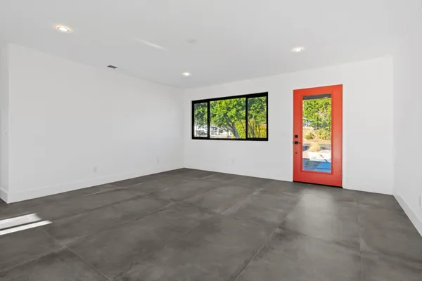 an empty room with windows