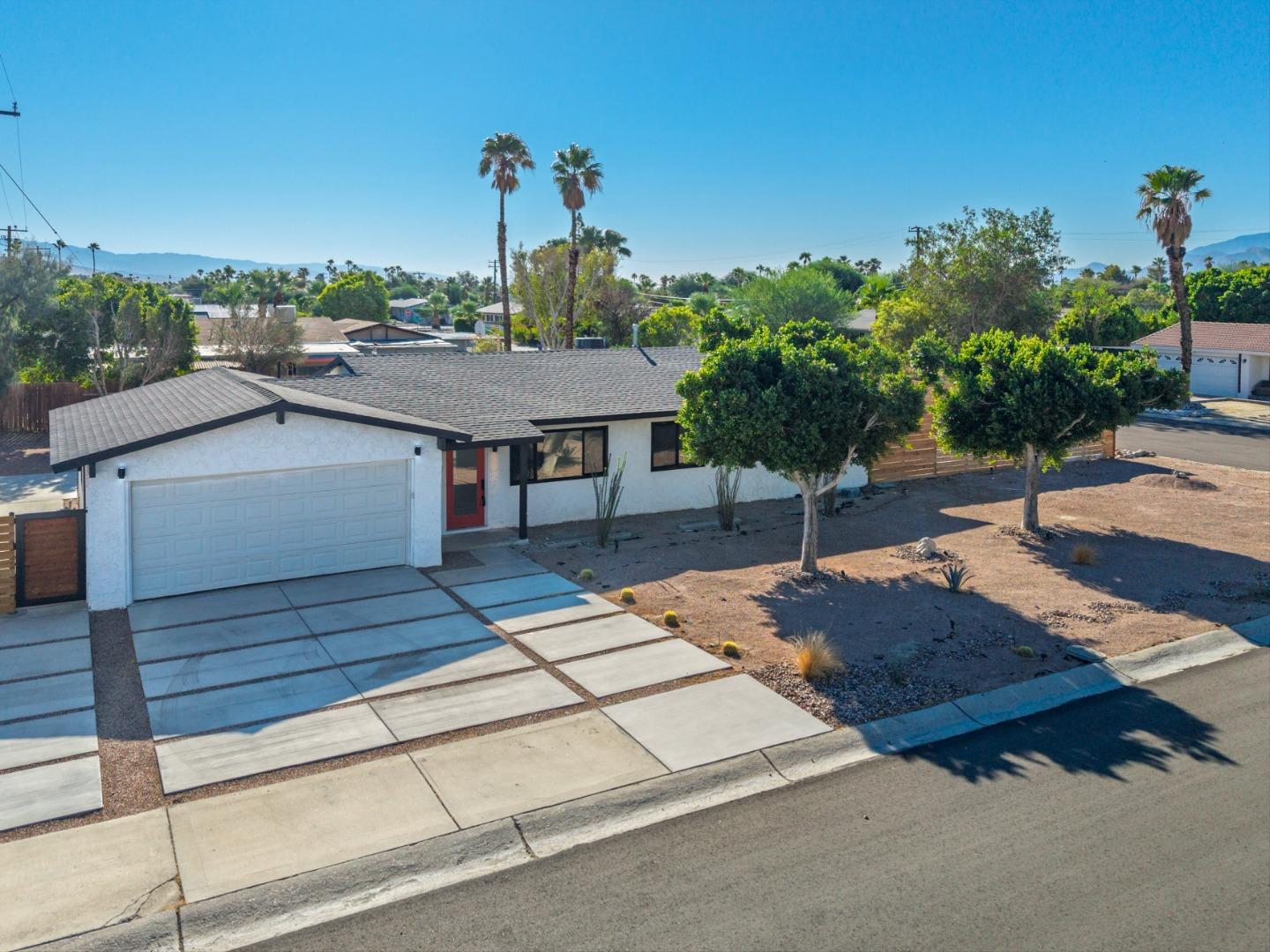 2600 North Chuperosa Road Palm Springs, CA 92262 - Photo 2 of 33 a terrace view with sitting space and garden