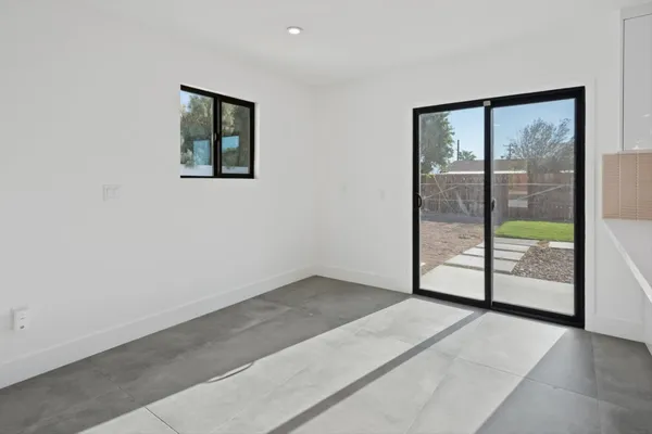 an empty room with sliding door