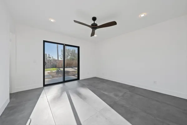 a view of empty room with windows