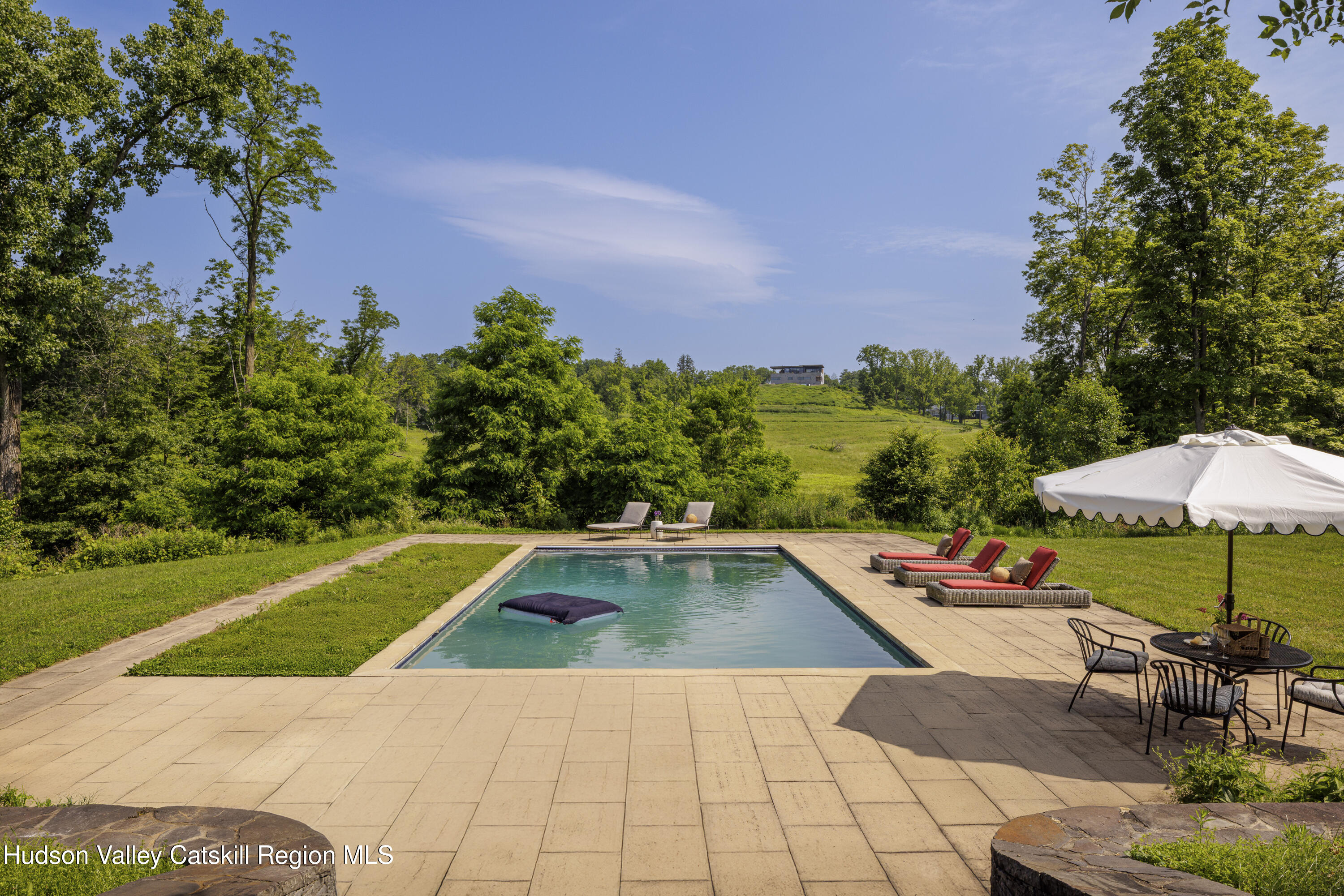 243 Morton Road Rhinebeck, NY 12572 - Photo 14 of 44 a view of swimming pool with lounge chair