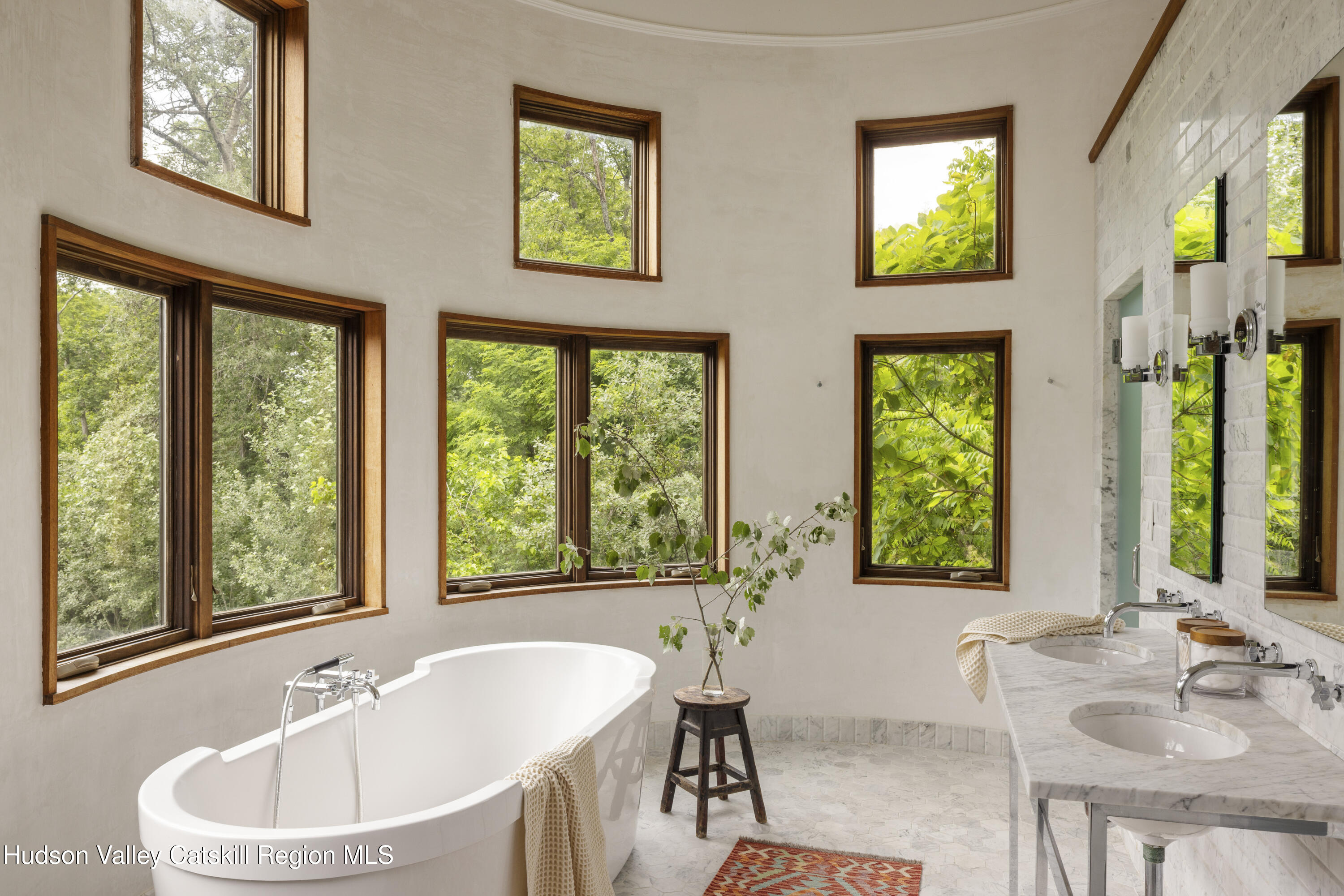 243 Morton Road Rhinebeck, NY 12572 - Photo 21 of 44 a bathroom with a tub a sink and a window