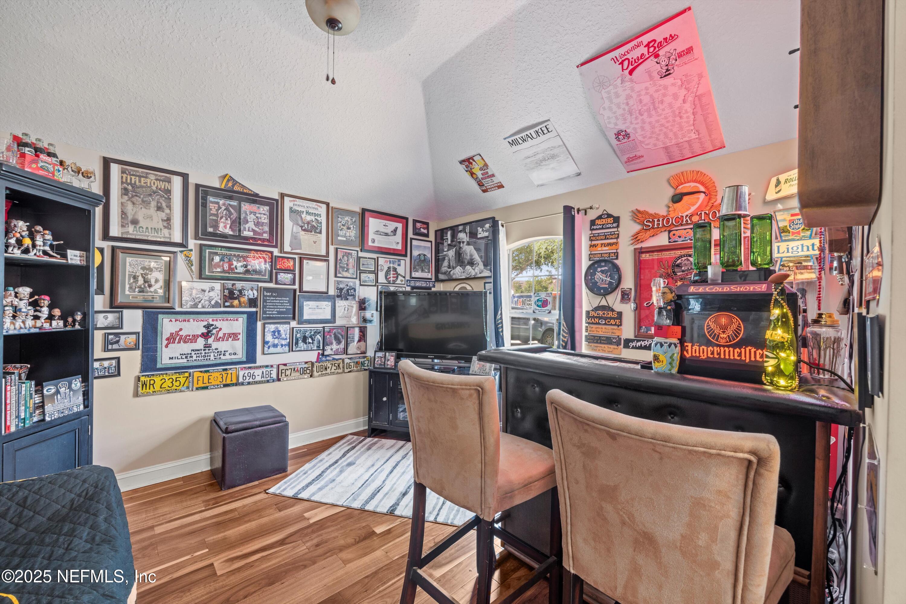 648 Battersea Drive St. Augustine, FL 32095 - Photo 12 of 59 a kitchen with stainless steel appliances kitchen island granite countertop a sink and cabinets