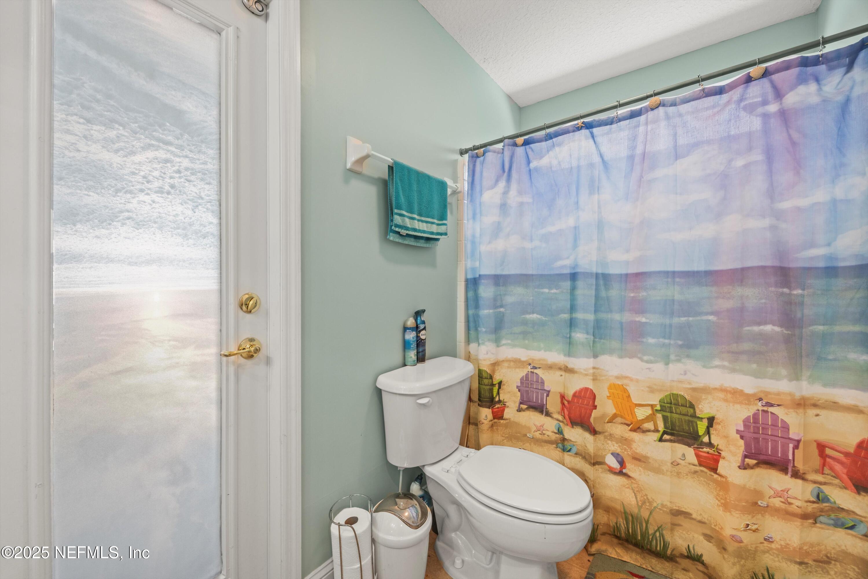 648 Battersea Drive St. Augustine, FL 32095 - Photo 34 of 59 a bathroom with a toilet and a shower