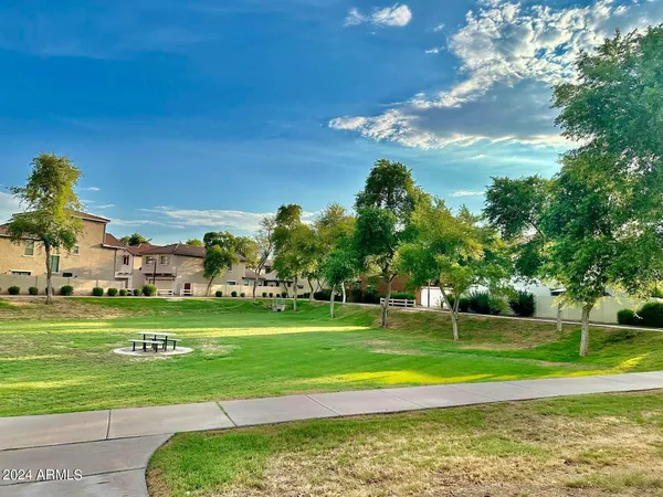 a view of a golf course with a lake