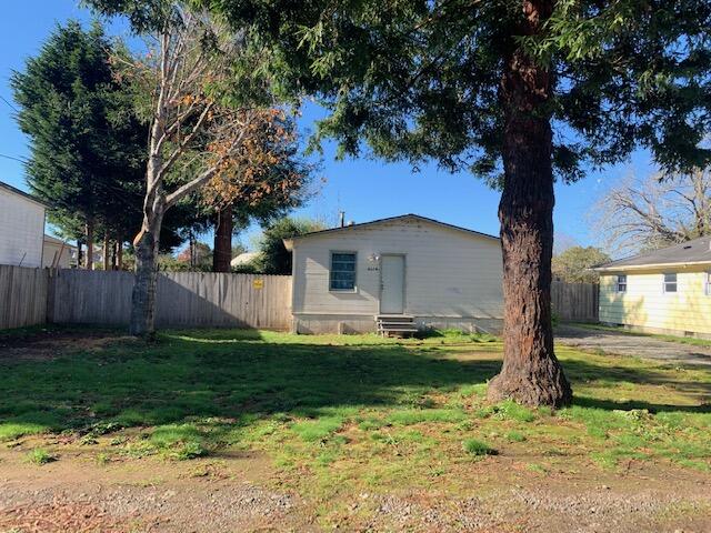 4040 Cedar Street Cutten, CA 95503 - Photo 18 of 21 a front view of house with yard and green space