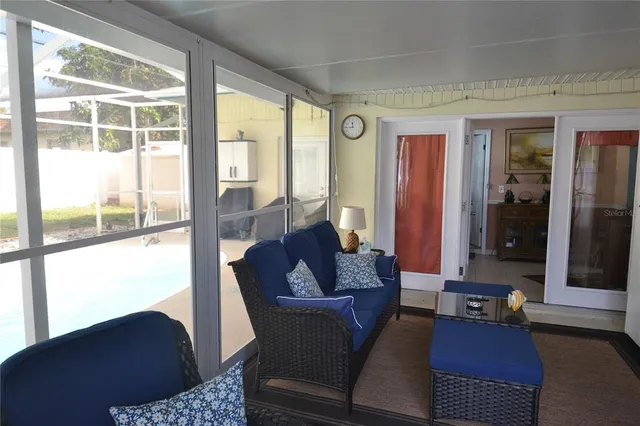 a living room with furniture and a couch