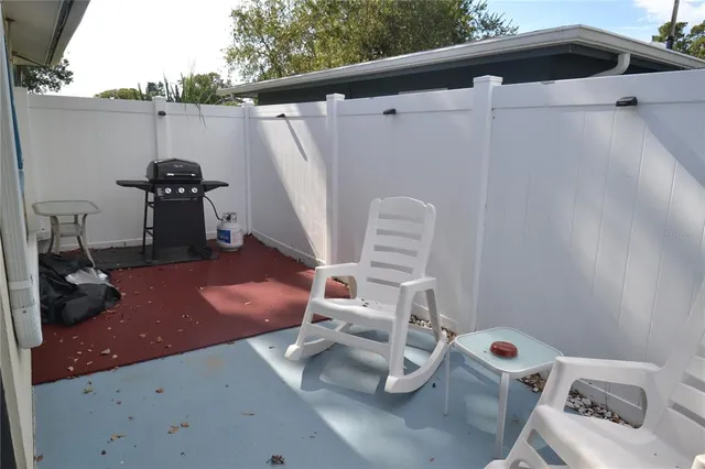 a view of outdoor space with seating area