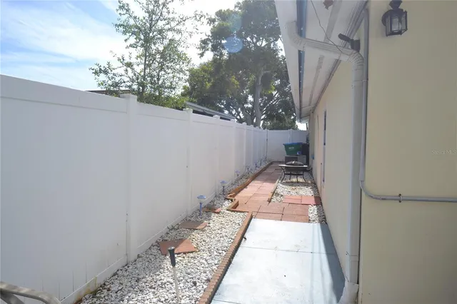 a view of backyard with cabin