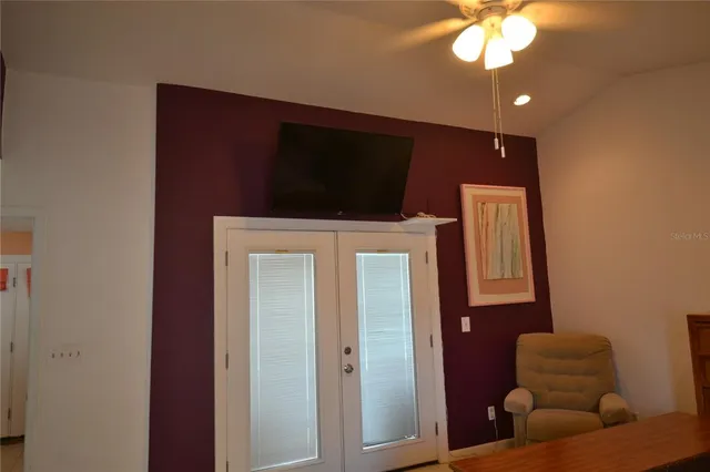 a kitchen with a sink cabinets and window