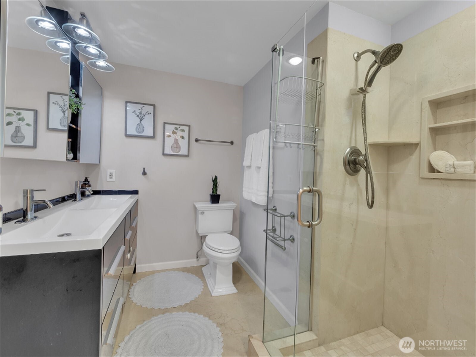 20921 28th Avenue Southeast Bothell, WA 98021 - Photo 13 of 37 a bathroom with a sink toilet and shower