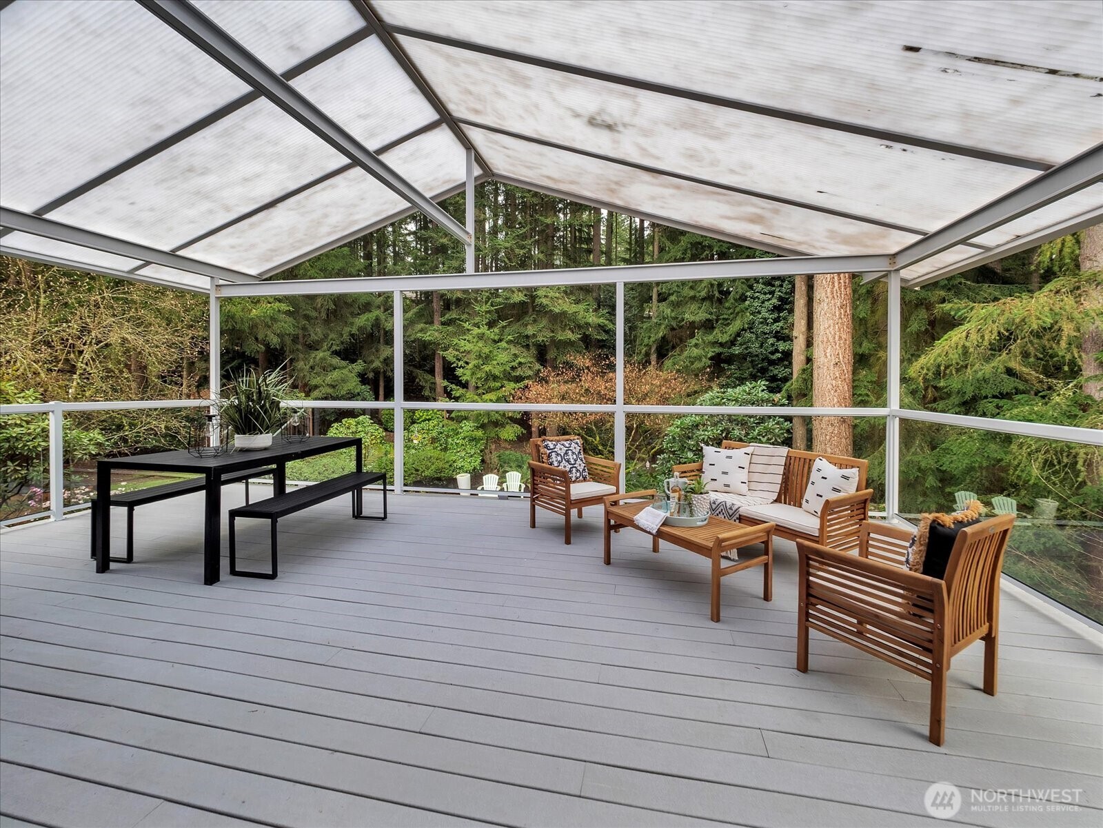 20921 28th Avenue Southeast Bothell, WA 98021 - Photo 17 of 37 a outdoor view with a sitting space and large trees
